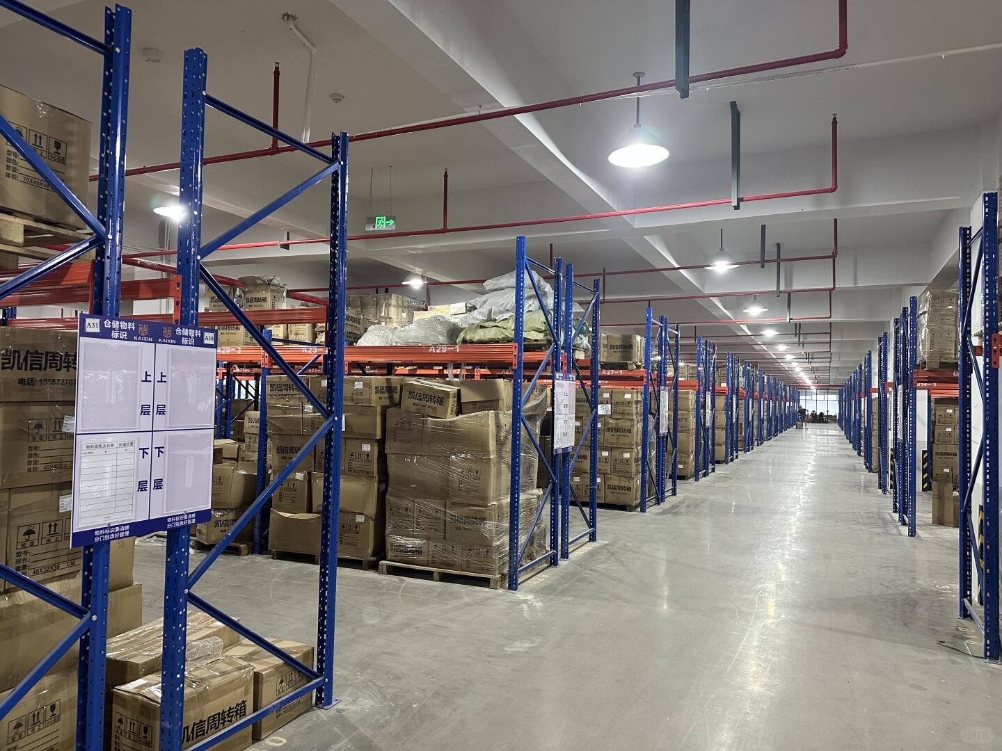 Warehouse aisle for packaging labeling and shipment readiness